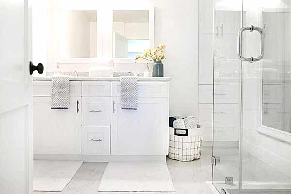 small-white-dual-bath-vanity-long-nickel-pulls